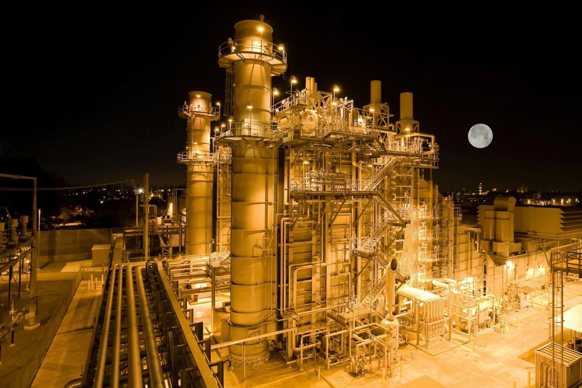 Power plant lit up at night